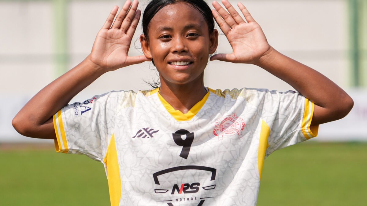 Herina of YWC, Manipur celebrates her winning goal against Sports Odisha