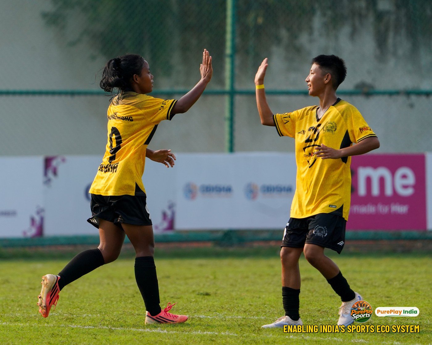 Herina and Abema of YWC, Manipur high-five after a goal against Pune Krida Prabhodhini Academy