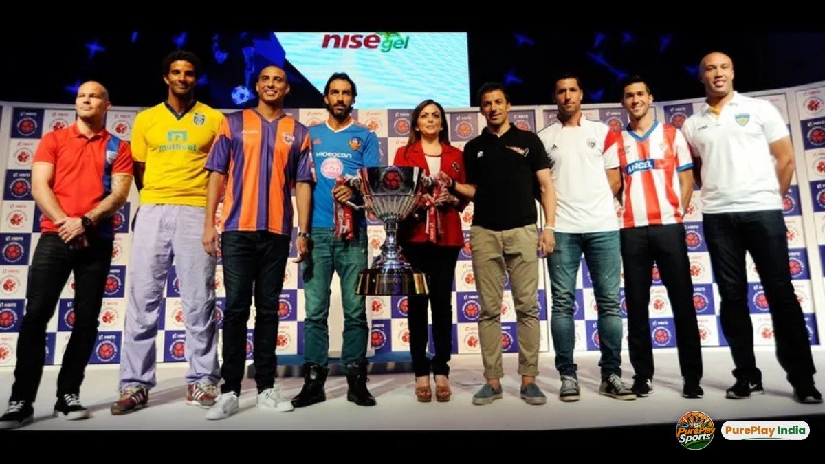 Players and club representatives with the ISL trophy at its unveiling ahead of the inaugural 2014 season