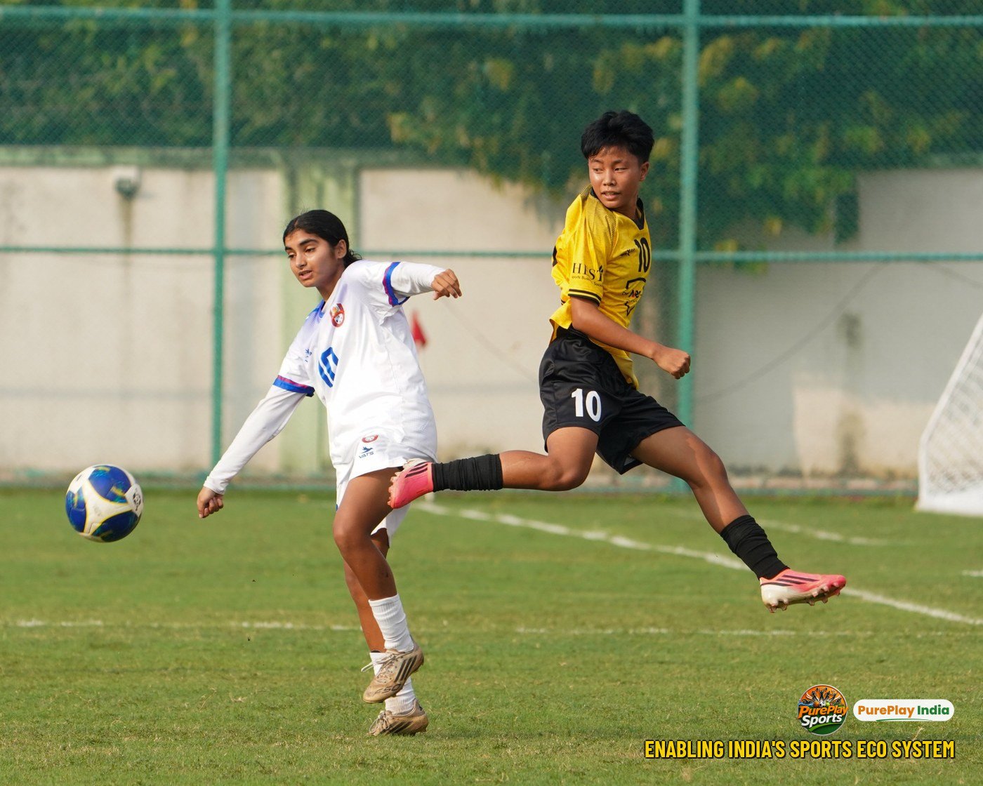 Luxmi of YWC, Manipur stretches to win the ball against Pune Krida Prabhodhini Academy